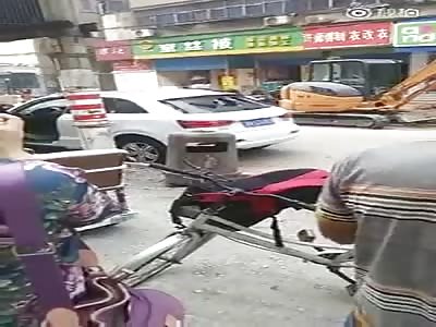 WOMAN DESTROYING AN AUTOMOBILE