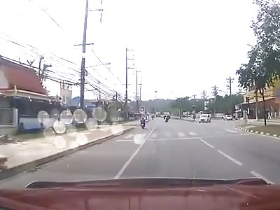 WOMAN IS RUN OVER BY MOTORCYCLE