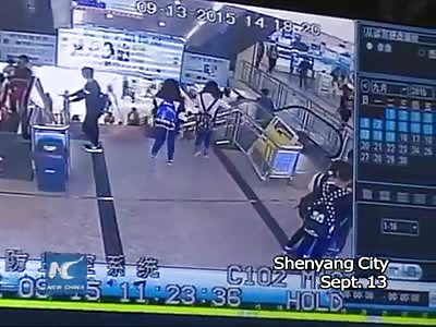 CHINESE WOMAN NARROWLY ESCAPES AS ESCALATOR FLOOR BREAKS OPEN