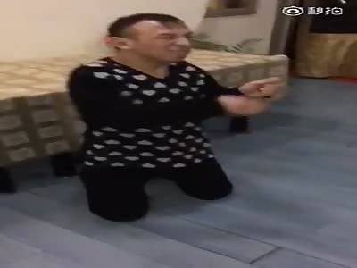 CHINESE ASSHOLE BEATING A MAN WITH MENTAL PROBLEMS