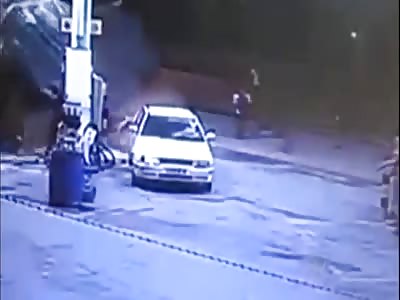 RUNAWAY TRUCK INVADES GAS STATION AND DUMPS LOAD OF BRICKS