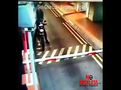 LORRY DRIVER RUNNING OVER RIDER AT THE CARPARK PAYMENT EXIT