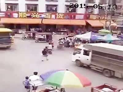 WOMAN RUN OVER BY TWO TRUCKS.