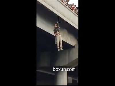 HANGED MAN ON A BRIDGE