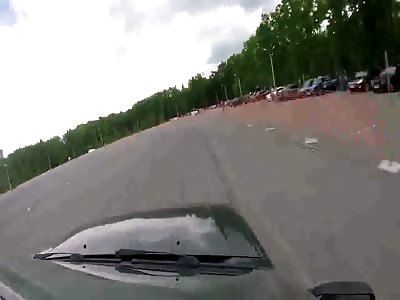Race Driver Loses Control and Hits the Onlooker 