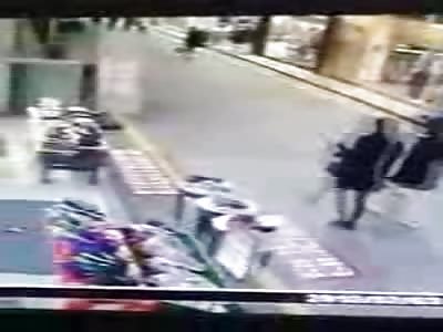 Driver Takes Out Pedestrians on Walkway GRAPHIC ACCIDENT