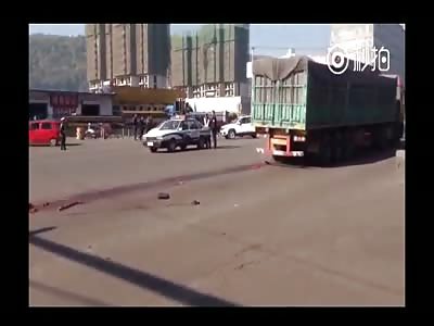 Man crushed in pieces by Truck.