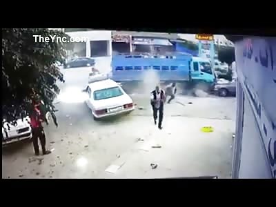 Truck Slams Into Group Of People.