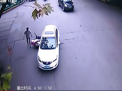 People Lift Car to Free Trapped Accident Victim