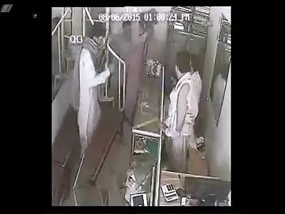 CCTV Footage of Jewelry Shop Robbery and Murder 