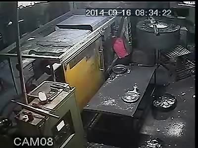 Man Having His Head Crushed by Hydraulic Press