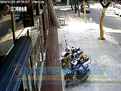 Man on scooter hitting car door crushed to death 