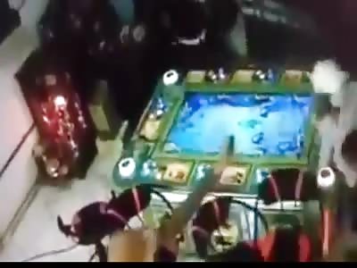 Machete attack in game room caught on camera