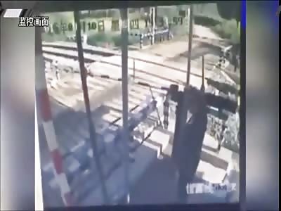 Motorcycle Hit by Train at Railway Crossing 