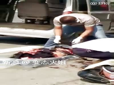 Cleaners collect dead woman body at accident Scene 