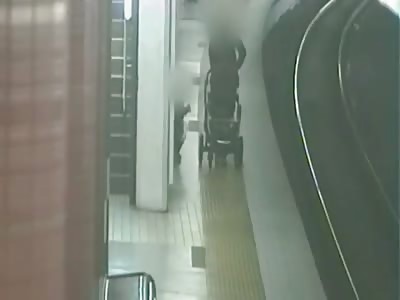 Pram Sucked Into Path of Train