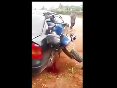 Motorcyclist Rams Parked Car Dies Embedded In It
