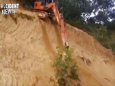 Excavator trying to move downhill