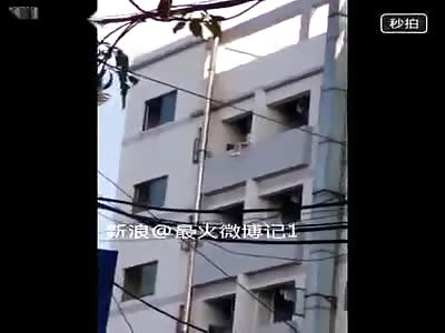 Girl Jumps Off Building - Lands on Her Feet, But it's Not a Good Idea