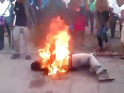 Protester on fire at Chiapas.