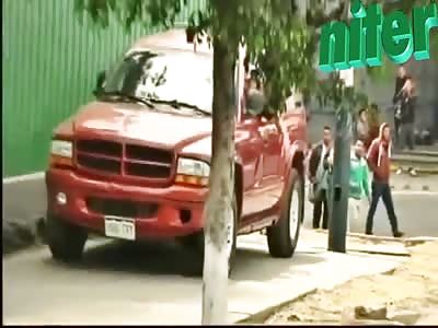 Driver run over peolpe that were blockinkg the avenue at Morelia Mex