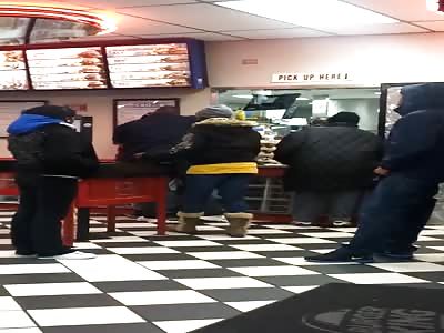 Black man holds another black man at gun point at Burger King !