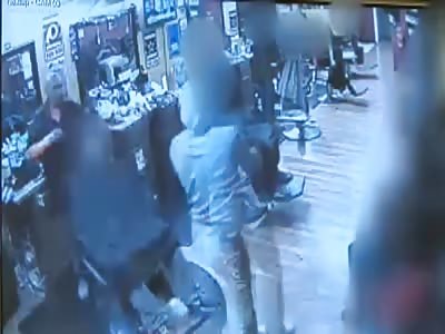VERY COOL: Armed robbers get shot by customer at barbershop!