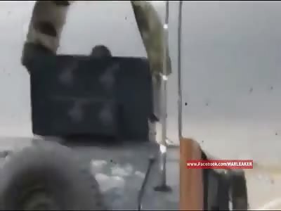 Iraqi Humvee Clears Road Of Stucked VBIED With Machine Gun Burst