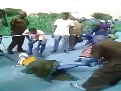 Public whipping of black woman by horny crowd