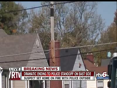 Man dances on roof of house he torched. Until the cops tazerize him.
