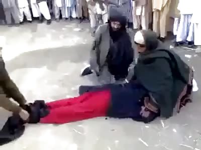Public whipping of crying girl by gay Taliban asshole