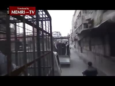 Jeish Al-Islam Militants Use Families of Syrian Soldiers as Human Shields in Cages