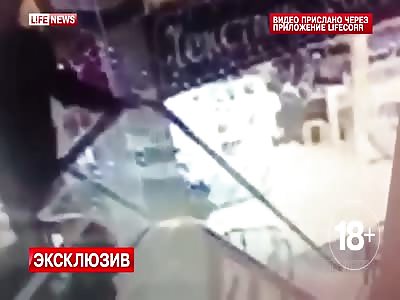Man Falls to Death From Escalator