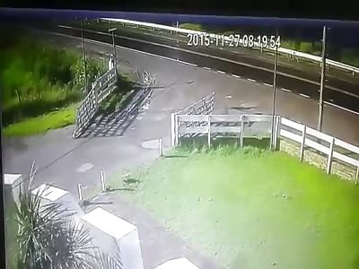 Turning Car Made Another Car Crash into a Fence and Overturn