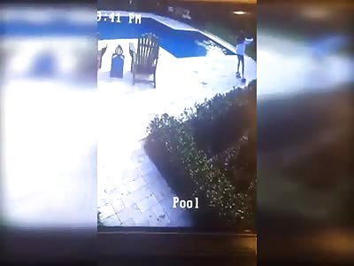 Girl falling off hoverboard then tumbling into swimming pool