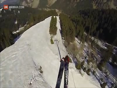 What this guy does with Ski's and a Parachute is crazy as hell, but awesome!