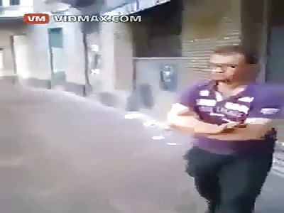Moron fights a trash bin, somehow he loses.