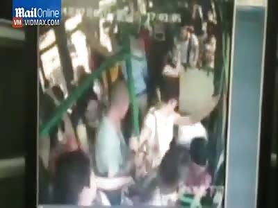 Chaos as arsonist sets fire to a packed bus in China.