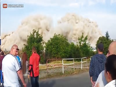 Guy gets almost killed by rock flying from demolition.