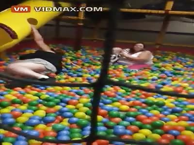 Morbidly Obese lady stuck in a kids ball pit.