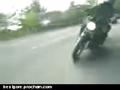 Reckless Motorcyclist Falls Under Oncoming Van on a Curve