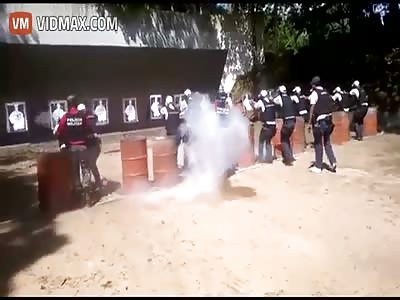 Police training goes awry when live ammo goes inside of the armor