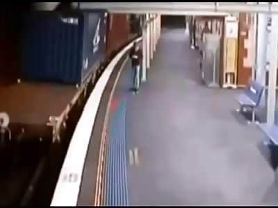 Shocking Moment when Woman Hurls Herself Onto Moving Train..Fails but Miraculously Survives