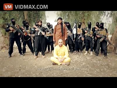 Isis executes a man wearing a yellow jumpsuit